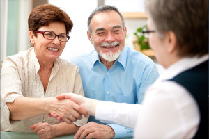 Image of an enrollment assister helping someone enroll in coverage